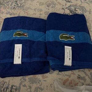 Lacoste blue Towel Set two towels 30in x 52in. NWT